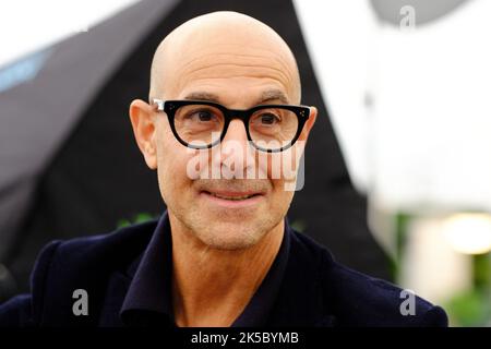 Cheltenham, Gloucestershire, UK – Friday 7th October 2022 – Stanley Tucci actor and author attends the opening day of this years Cheltenham Literature Festival to talk about his latest book Taste - My Life Through Food - Photo Steven May / Alamy Live News Stock Photo