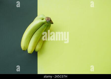 top view of banana on black and yellow background  Stock Photo