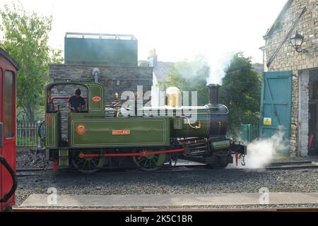 A narrow-gauge steam railway engine waiting in Port Erin station, Isle of Man. Stock Photo