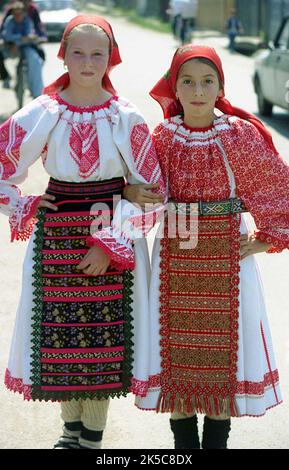 Maieru, Bistrița-Năsăud County, Romania, 2000. Young girls in beautiful traditional folk costumes. Stock Photo