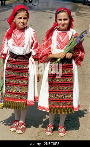 Maieru, Bistrița-Năsăud County, Romania, 2000. Young girls in beautiful traditional folk costumes. Stock Photo