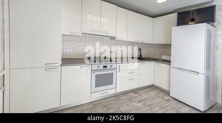 Corner white kitchen set. Stock Photo