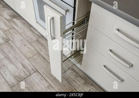 White kitchen set, bedside table with drawers. Stock Photo