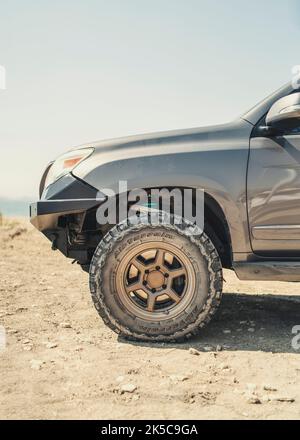 Offroad vehicle closeup in the desert Stock Photo