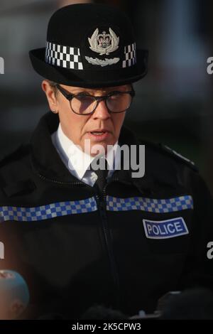 Deputy Chief Constable of Derbyshire Constabulary, Kate Meynell, issues a statement at the scene outside Ascot Drive police station in Derby where a man was taken to hospital after being shot by armed officers. Picture date: Friday October 7, 2022. Stock Photo