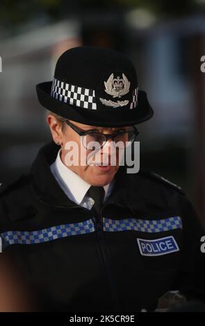 Deputy Chief Constable of Derbyshire Constabulary, Kate Meynell, issues a statement at the scene outside Ascot Drive police station in Derby where a man was taken to hospital after being shot by armed officers. Picture date: Friday October 7, 2022. Stock Photo