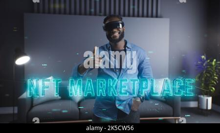 Joyful african american man in virtual reality glasses. 3d inscription NFT Marketplace. Virtual market of the future Stock Photo