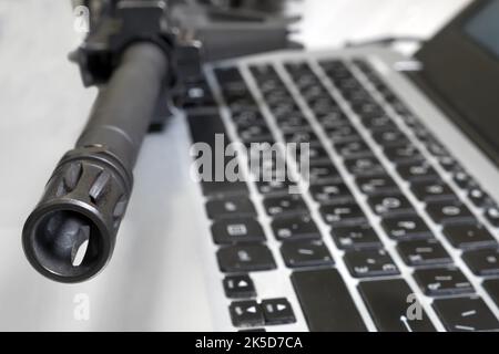 Spy. Barrel gun. Espionage. Media war crime investigation computer. Hybrid war propaganda. Arms trade weapon shop. Defence security data protect Stock Photo
