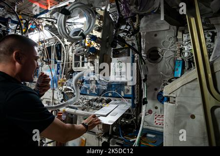 Expedition 67 Flight Engineer and NASA astronaut Kjell Lindgren participates in a ham radio session in commemoration of the Amateur Radio Relay League's 2022 Field Day supporting public service, emergency preparedness, community outreach, and technical skills all in a single event. Stock Photo