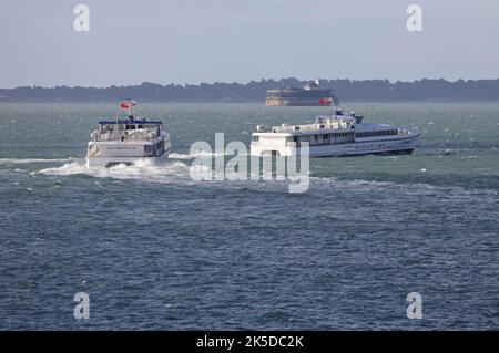 The Wightlink passenger ferries WIGHT RYDER I and II head towards the Isle of Wight Stock Photo