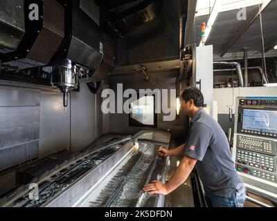 Parts for the Orion crew module which will carry astronauts on Artemis II are machined at Aerospace Engineering Corporation in California on June 18, 2018. Stock Photo