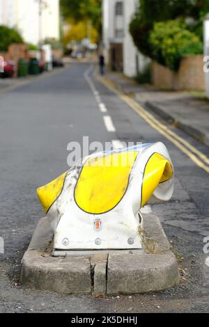 A badly damaged road traffic bollard in Cheltenham UK Stock Photo