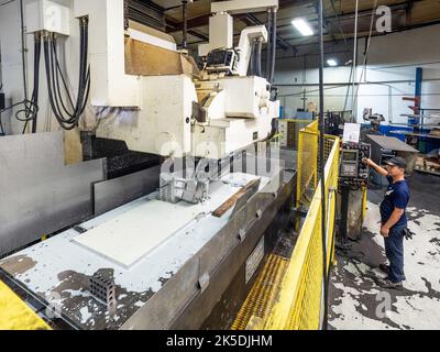 Parts for the Orion crew module which will carry astronauts on Artemis II are machined at Aerospace Engineering Corporation in California on June 18, 2018. Stock Photo