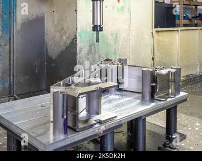 Parts for the Orion crew module which will carry astronauts on Artemis II are machined at Aerospace Engineering Corporation in California on June 18, 2018. Stock Photo