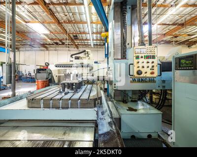 Parts for the Orion crew module which will carry astronauts on Artemis II are machined at Aerospace Engineering Corporation in California on June 18, 2018. Stock Photo