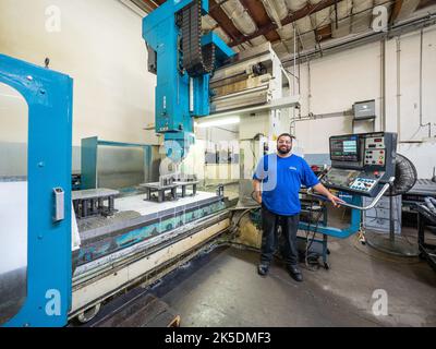 Parts for the Orion crew module which will carry astronauts on Artemis II are machined at Aerospace Engineering Corporation in California on June 18, 2018. Stock Photo