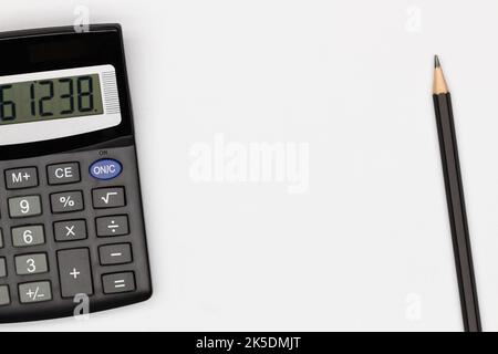 Top view office table desk. Financial report. Flat lay. Workspace with Business office supplies, empty sheet of paper, pencil, calculator Stock Photo