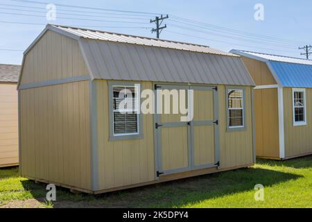 Storage shed made of wood for gardening tools equipment Stock Photo