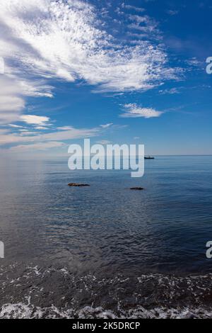 Mediterranean Sea with half sky with clouds and half clear Stock Photo