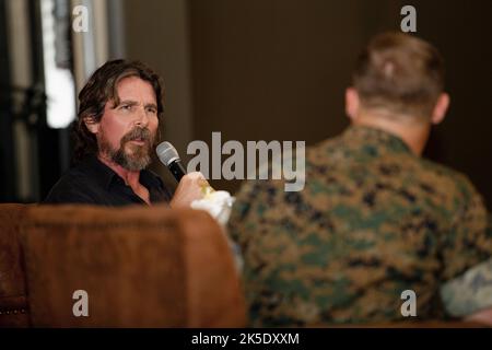 Oceanside, United States. 06th Oct, 2022. English actor Christian Bale responds to a question from U.S. Marine MSgt. Wayne Edmiston, right, during an onstage discussion about his latest movie “Amsterdam“, at the Pendleton Theater & Training Center on MCB Camp Pendleton, October 6, 2022 in Oceanside, California. Credit: LCpl. Hope Straley/US Marines/Alamy Live News Stock Photo