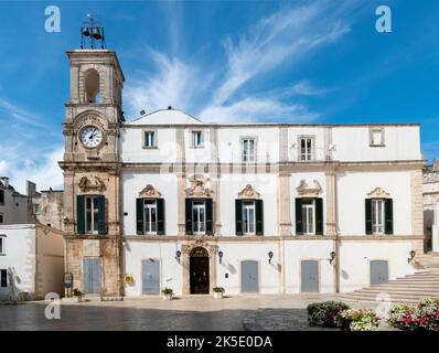 old university palace with clock tower at piazza plebiscito in Martina Franca, Italy Stock Photo