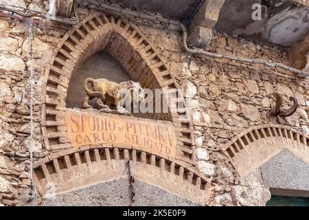 Details of old sign of painting studio on Via Teatro Greco in Taormina comune in Metropolitan City of Messina, on east coast of Sicily Island, Italy Stock Photo