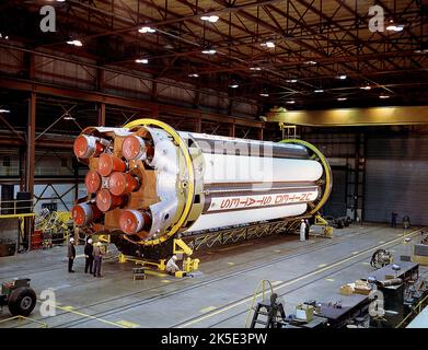 NASA Marshall Space Flight Center engineers prepare the Saturn I S-I stage for checkout in Building 4705. The Saturn I S-I stage had eight H-1 engines clustered, using liquid oxygen/kerosene-1 propellants capable of producing a total of 1,500,000lbs of thrust. Originally developed by Dr. von Braun's team at the U.S. Army Ballistic Missile Agency, 10 Saturn I rockets were flown before being replaced by the Saturn IB. Saturn I launches enabled the Pegasus satellites and the flight verification of the Apollo Command and Service Module aerodynamics in the launch phase. January 1961. Credit: NASA Stock Photo