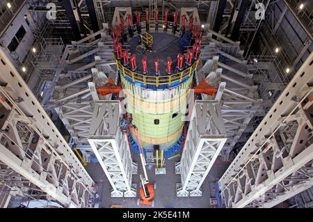 Space Launch System Intertank Readied for Structural Testing. Engineers installed structural test hardware for NASA's deep space rocket, the Space Launch System, into a test stand at NASA's Marshall Space Flight Center in Huntsville, Alabama where testing recently began. The test version of the SLS intertank is being pushed, pulled and bent with millions of pounds of force to ensure it can withstand the forces of launch and ascent. An optimised version of an original NASA image. Credit: NASA/TBoles Stock Photo