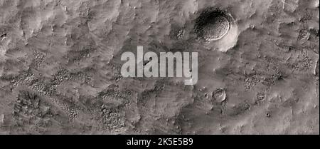 Martian landscape. This HiRISE image shows landforms on the surface of Mars. Sample of the terrain in the Southern Mid-Latitudes This area may contain ice table-related morphologies. Image taken from 251 km above the surface; terrain shown less than 5 km across. A unique optimised version of NASA imagery. Credit: NASA/JPL/UArizona Stock Photo