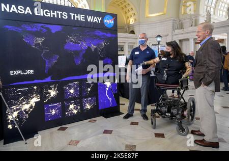 NASA Administrator Bill Nelson, right, visits NASA’s exhibits during Earth Day, Friday, April 22, 2022, at Union Station in Washington. Stock Photo