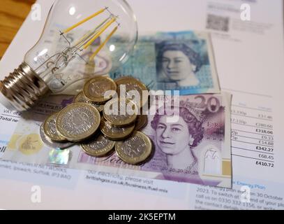 London, UK. 07th Oct, 2022. (221008) -- LONDON, Oct. 8, 2022 (Xinhua) -- Photo taken on Oct. 7, 2022 shows a household's electricity bill and some money in London, Britain. British households could face blackouts this winter if there are reduced European electricity imports and insufficient gas supplies in the country, a report warned on Thursday. In the extreme scenario, it could erode the security of supply margins and mean some customers could be without power for pre-defined periods during the day. However, the event is 'unlikely,' said the Winter Outlook Report published by National Grid  Stock Photo