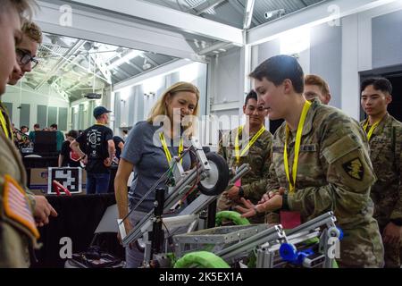 Kennedy Space Center Director Janet Petro visits West Point students during NASA’s LUNABOTICS competition on May 23, 2022, where teams operate autonomous and remote-controlled robots to collect simulated lunar soil in a mining challenge at the Center for Space Education. Stock Photo