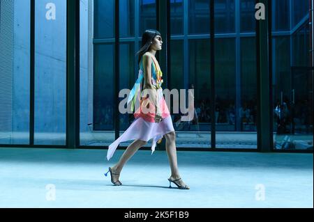 Lisbon, Portugal. 07th Oct, 2022. A model walks the runway during ...