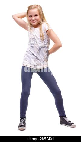 Get into the groove. Full length shot a young girl posing against white background. Stock Photo