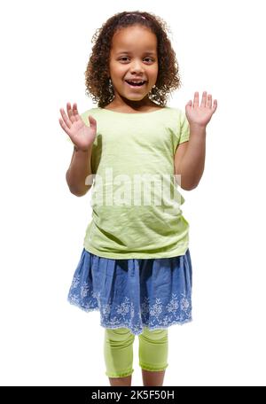 Hi. Cute little african american girl standing against a white background with her hands raised. Stock Photo