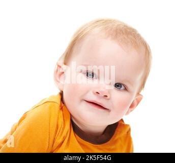The picture of innocence. Portrait of a cute baby boy looking at the camera against a white background. Stock Photo