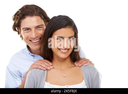 Hes got my back. A multi-ethnic couple isolated on a white background. Stock Photo