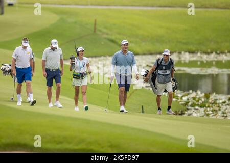 Su-Ann Heng, LIV Golf Broadcaster, stands near the first tee during the