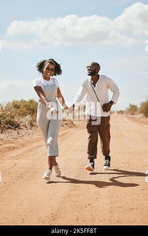 Black couple on road trip, happy people walking on vacation and Los Angeles festival travel. Summer holiday, trendy fashion lifestyle and love Stock Photo