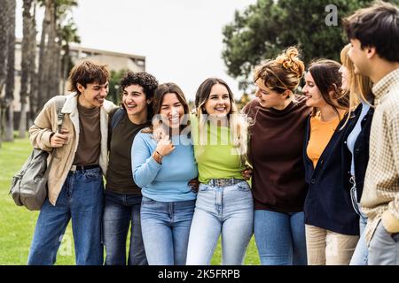 Happy group of teenagers having fun outside university - Young students people lifestyle concept Stock Photo