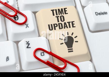 Conceptual display Time To Update. Word for System software update for enhancement or compatibility Stock Photo