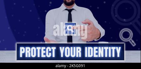 Hand writing sign Protect Your Identity. Word for secure from data breach and information security Stock Photo