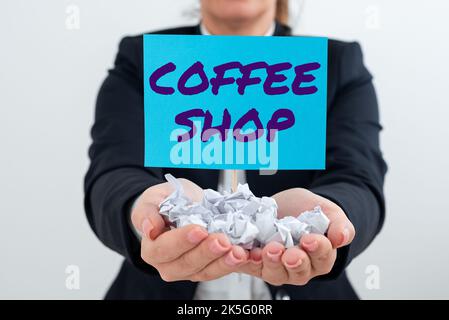 Conceptual caption Coffee Shop. Business approach a restaurant that primarily serves coffee, and light meals Stock Photo