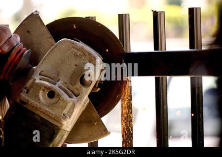 cutting metal, stones and ceramics with sparks Stock Photo