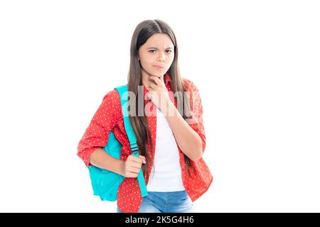 Schoolgirl in school uniform with school bag. Schoolchild, teen student on isolated background. Angry teenager girl, upset and unhappy negative Stock Photo