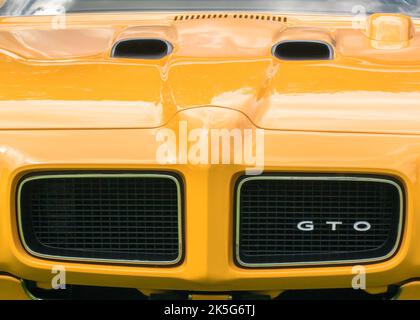 GROSSE POINTE SHORES, MI/USA - JUNE 21, 2015: A 1970 Pontiac GTO 'The Judge' car (named from a Sammy Davis, Jr. TV show 'Rowan & Martin's Laugh-In'. Stock Photo