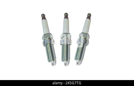 close up photo of spark plug parts for gasoline fueled cars on white background Stock Photo