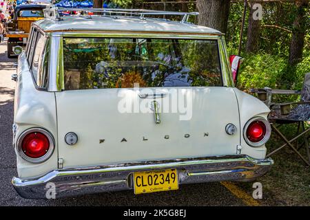 Falcon Heights, MN - June 18, 2022: High perspective rear view of a 1963 Ford Falcon Station Wagon at a local car show. Stock Photo