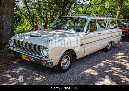 Falcon Heights, MN - June 18, 2022: High perspective front corner view of a 1963 Ford Falcon Station Wagon at a local car show. Stock Photo