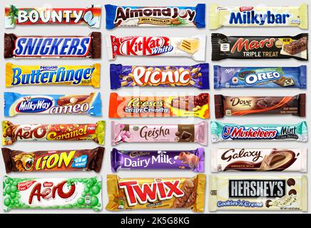 Chocolate candy bar collection, front view confectionery assortment on grey background Stock Photo